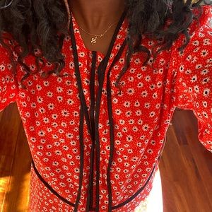 This is a knee length  CECE ditsy print dress. It is barely worn